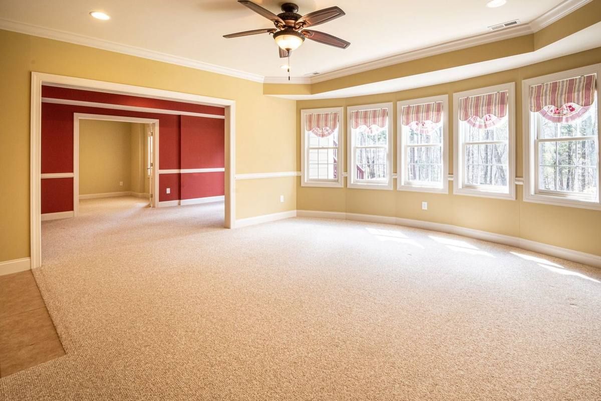 Freshly shampooed carpets in a bright room
