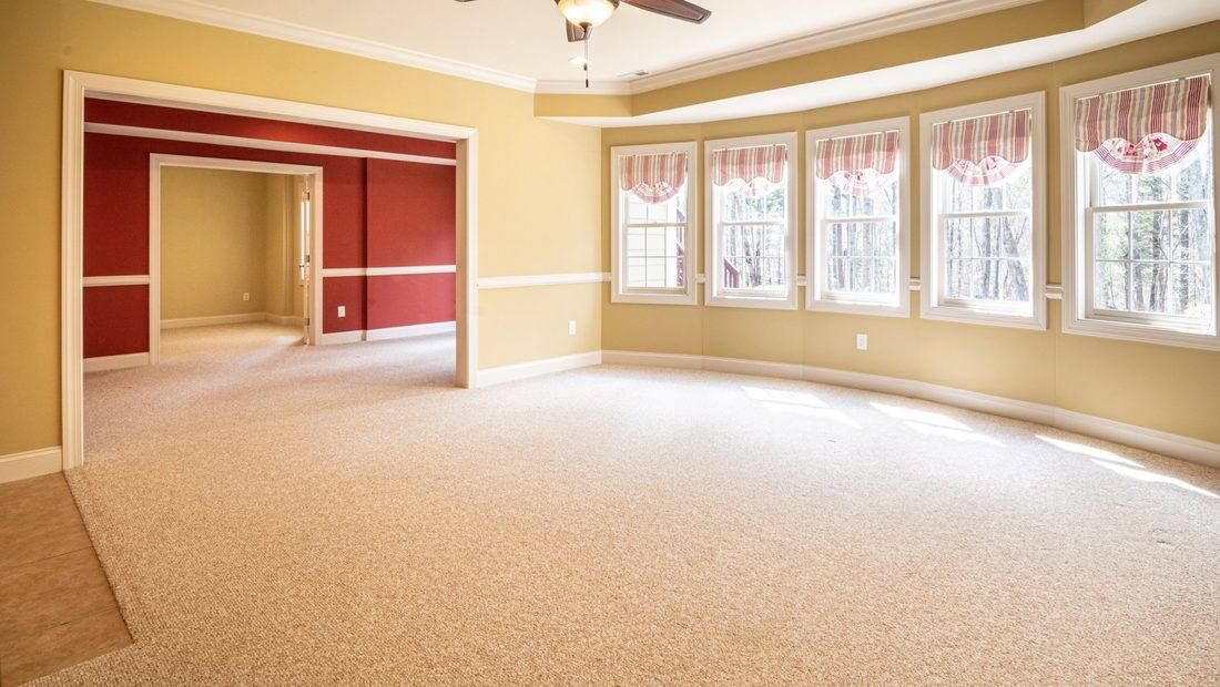 Freshly shampooed carpets in a bright room