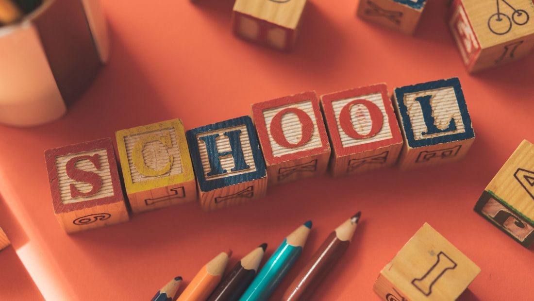 Wooden blocks spelling SCHOOL